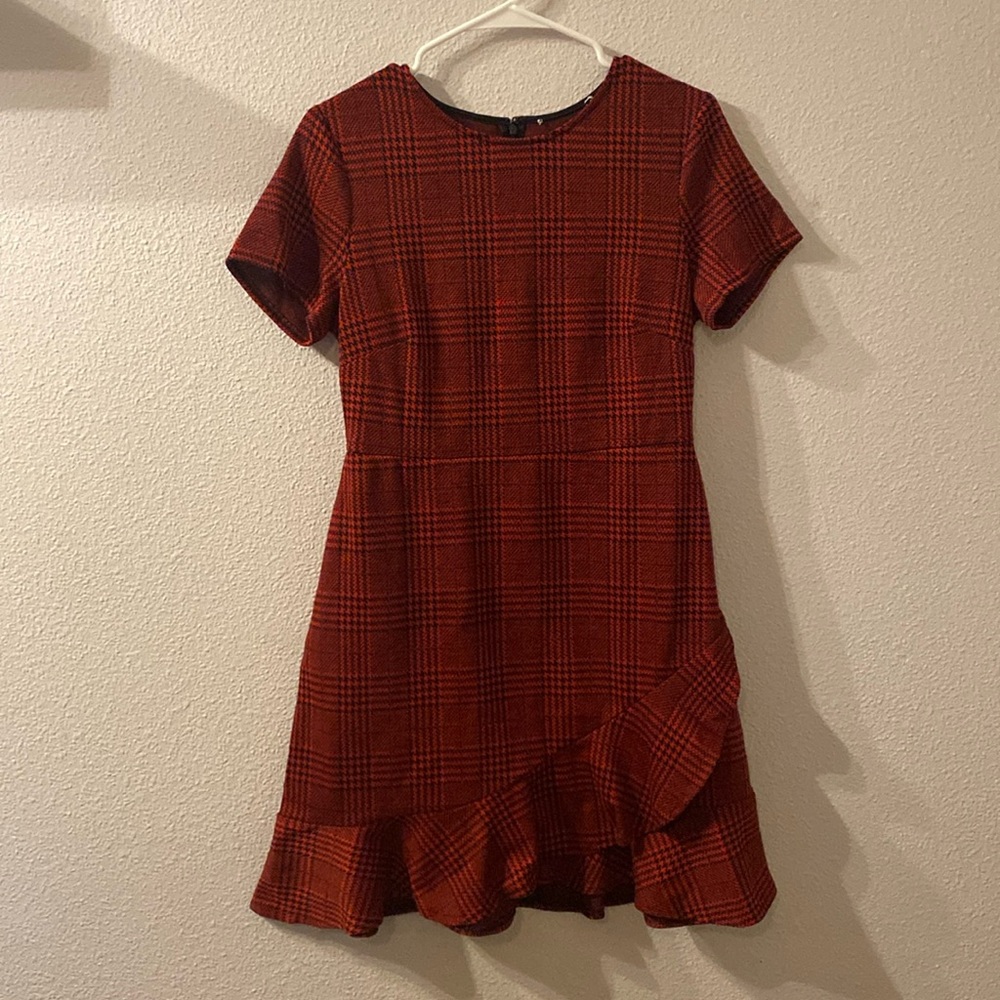 Long Times ruffle bottom dress size is cut out fits like a medium